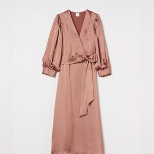 Calf-length dress in softly draping satin with a deep V-neck. Size S NWT!